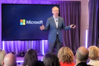 Navigating the Crossroads of AI Investments, Job Cuts, and the Future of Work: Insights from Microsoft President Brad Smith