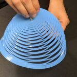 Rapid Deploying Kirigami Parachute for Quick and Stable Humanitarian Aid Delivery
