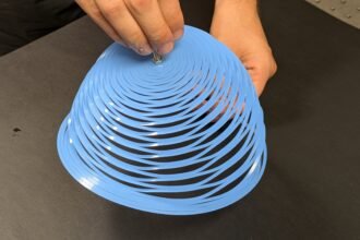Rapid Deploying Kirigami Parachute for Quick and Stable Humanitarian Aid Delivery