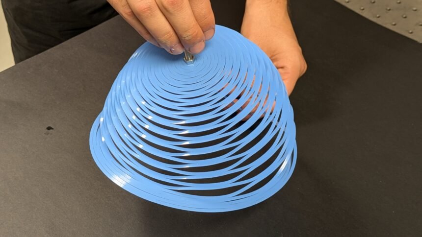 Rapid Deploying Kirigami Parachute for Quick and Stable Humanitarian Aid Delivery