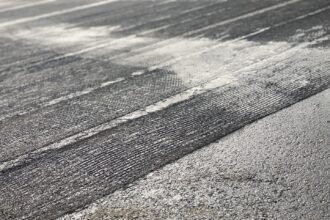 Smart Roads: Monitoring Asphalt Conditions with Bio-based Sensor Fabric
