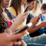 Hooked: The Impact of Smartphone Addiction on Teenagers in School